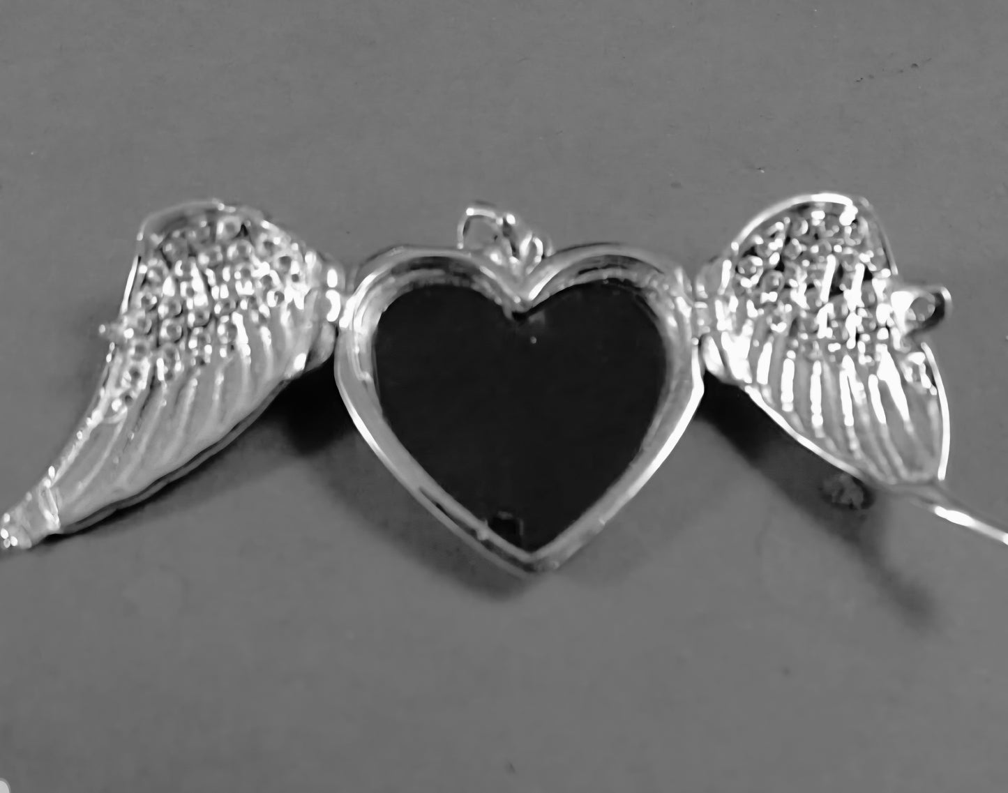 Angel wing CZ Heart Locket